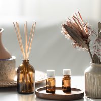 Spa composition with incense sticks, air humidifier and aroma oils. Aroma oil diffuser lamp with the stick perfume.